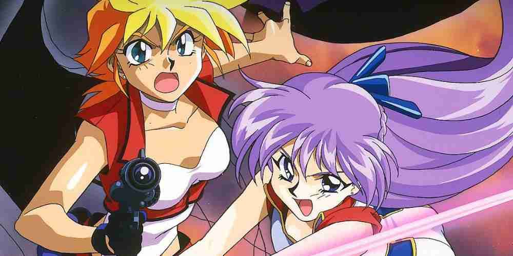 The two protagonists of Dirty Pair Flash hold their weapons.