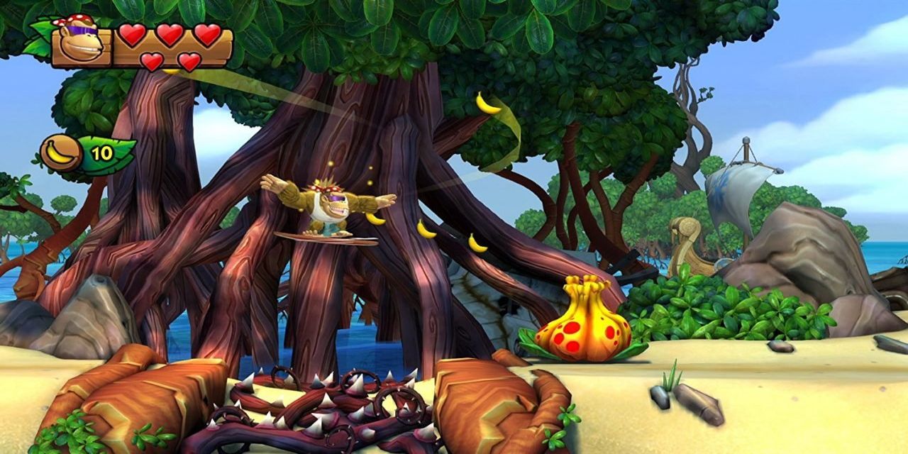 Funky Kong leaps through a bunch of bananas in Donkey Kong Country Tropical Freeze