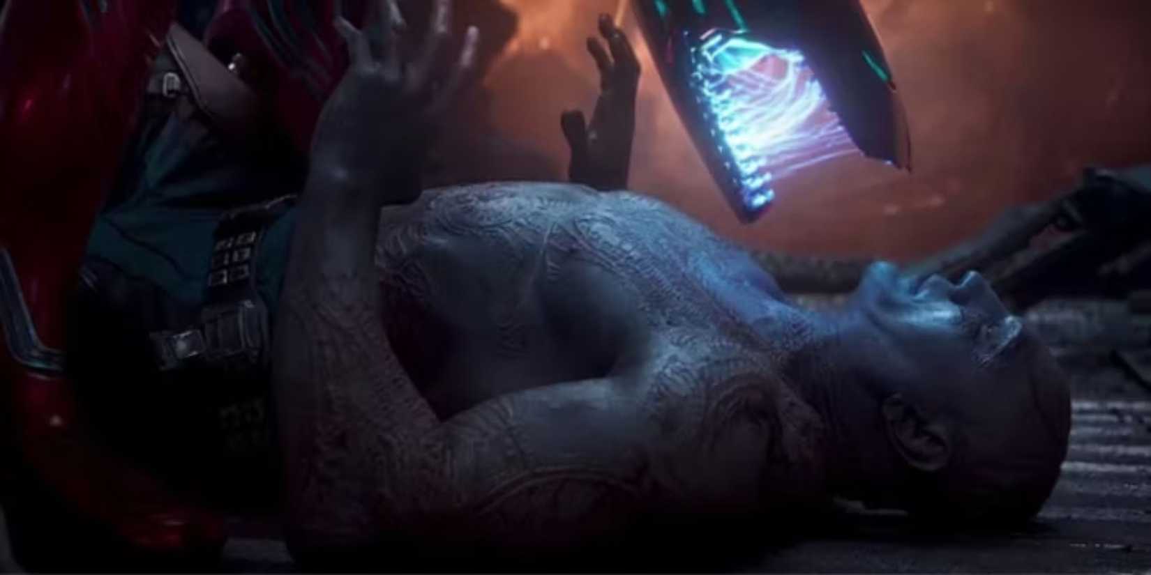 Drax being threatened by Iron Man
