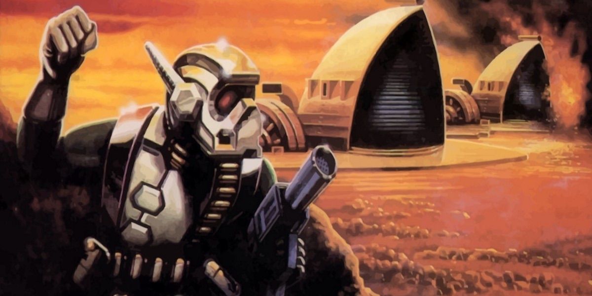 A figure stands in front of the desert from Dune II