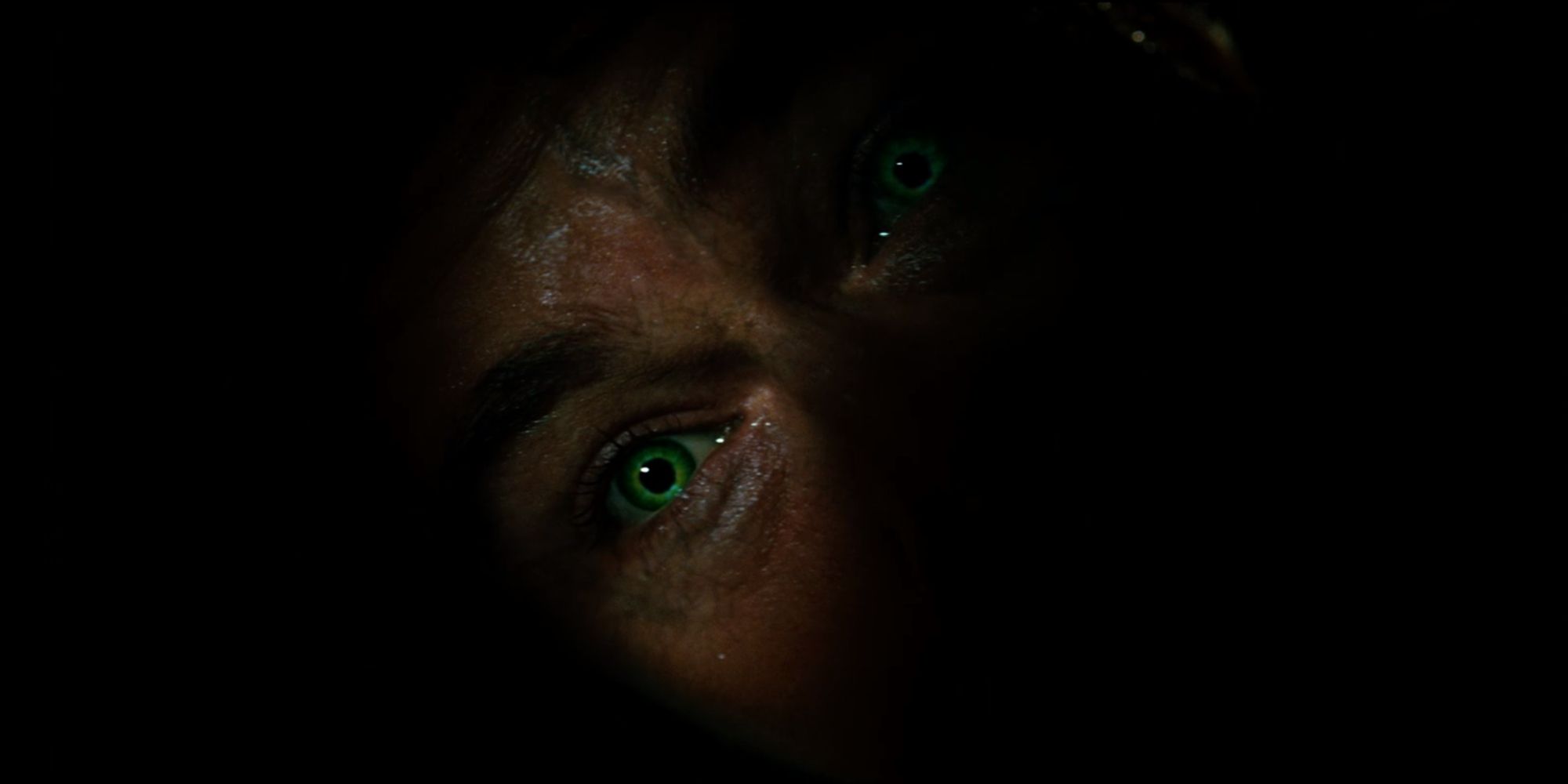 Edward Norton as Bruce Banner with glowing green eyes in The Incredible Hulk (2008)