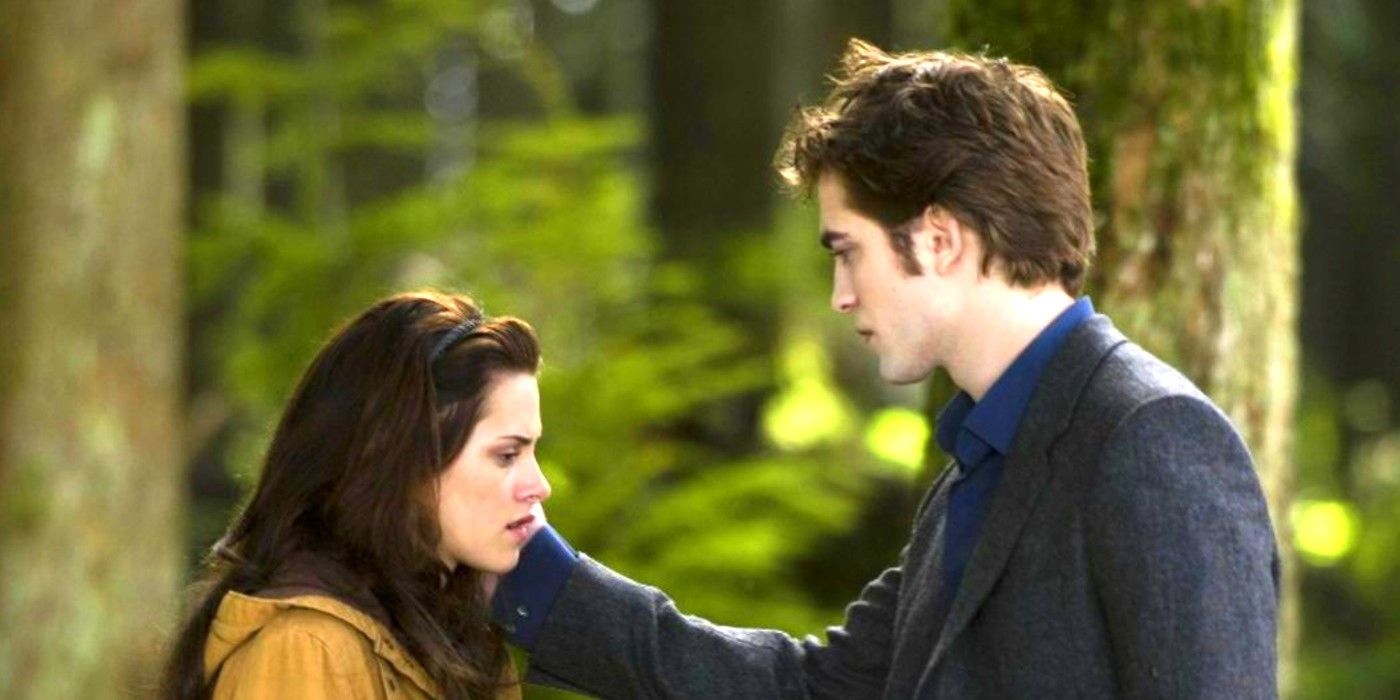 Edward touching Bella's cheek in the woods before leaving her in New Moon