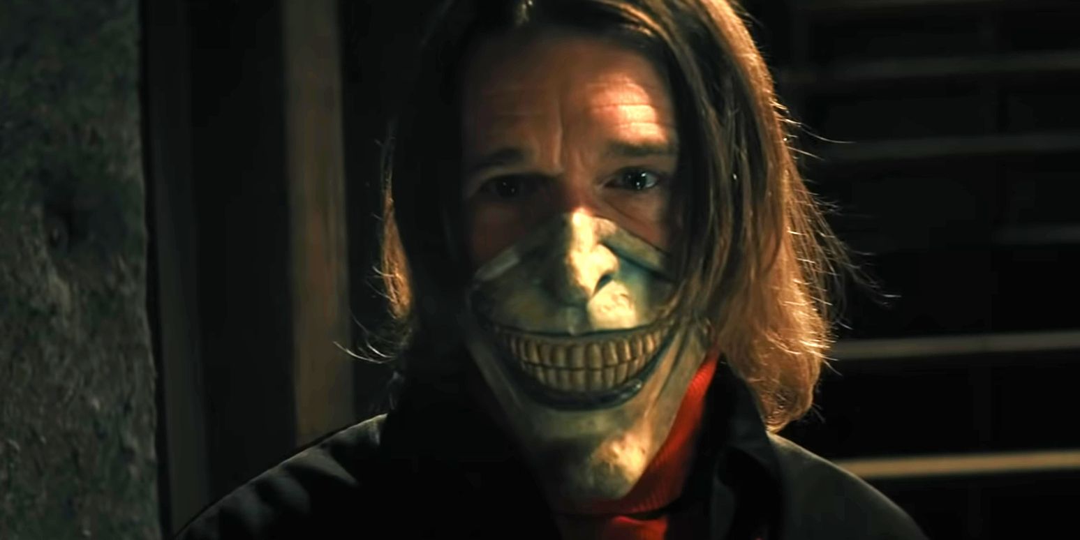 Ethan-Hawke-as-the-Grabber- wearing the bottom half of his mask in-The-Black-Phone