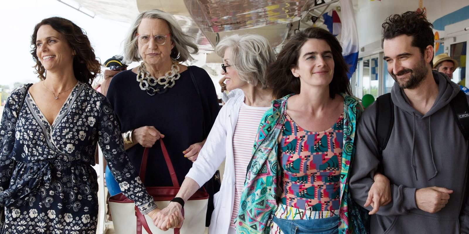 Family walking along in Transparent