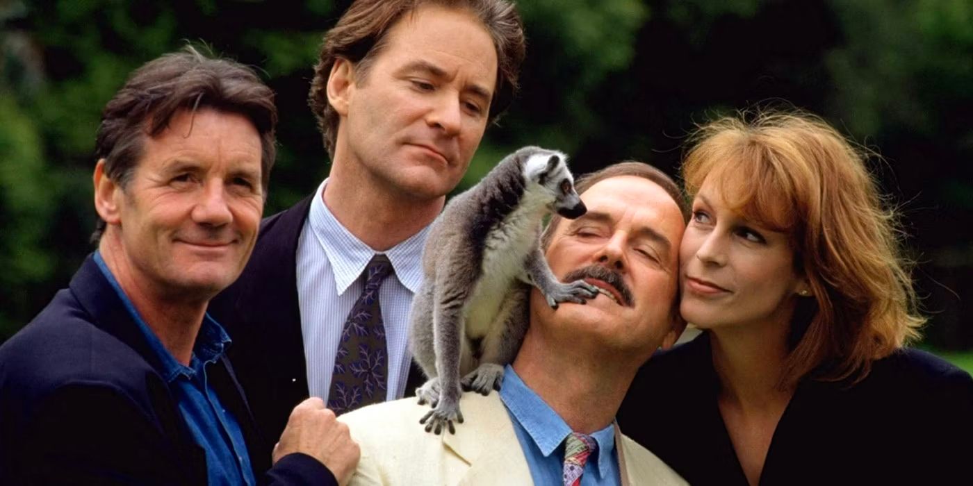 Fierce Creatures Cast photo with John Cleese, Michael Palin, Kevin Cline, Jamie Lee Curtis and a monkey