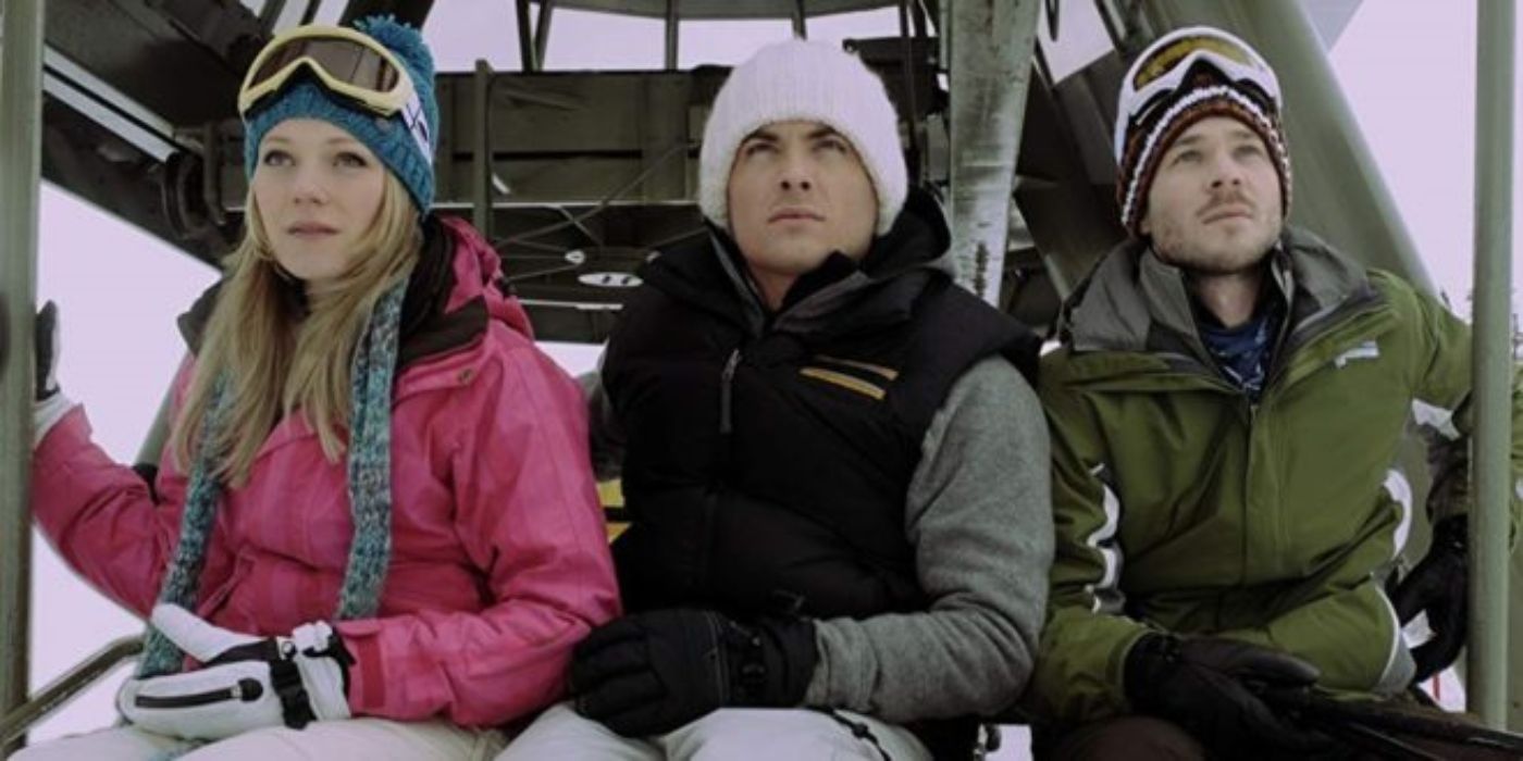 Parker, Joe and Dan sitting on a ski lift in Frozen