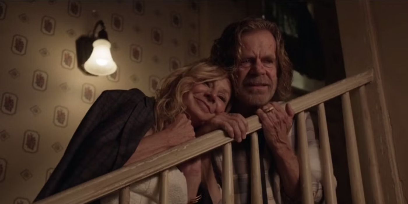 Frank and Monica leaning on each other on the stairs in Shameless.