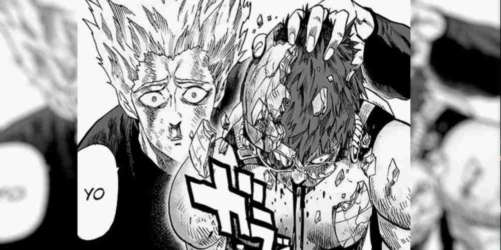 Garou holds up the bloodied Mumen Rider.