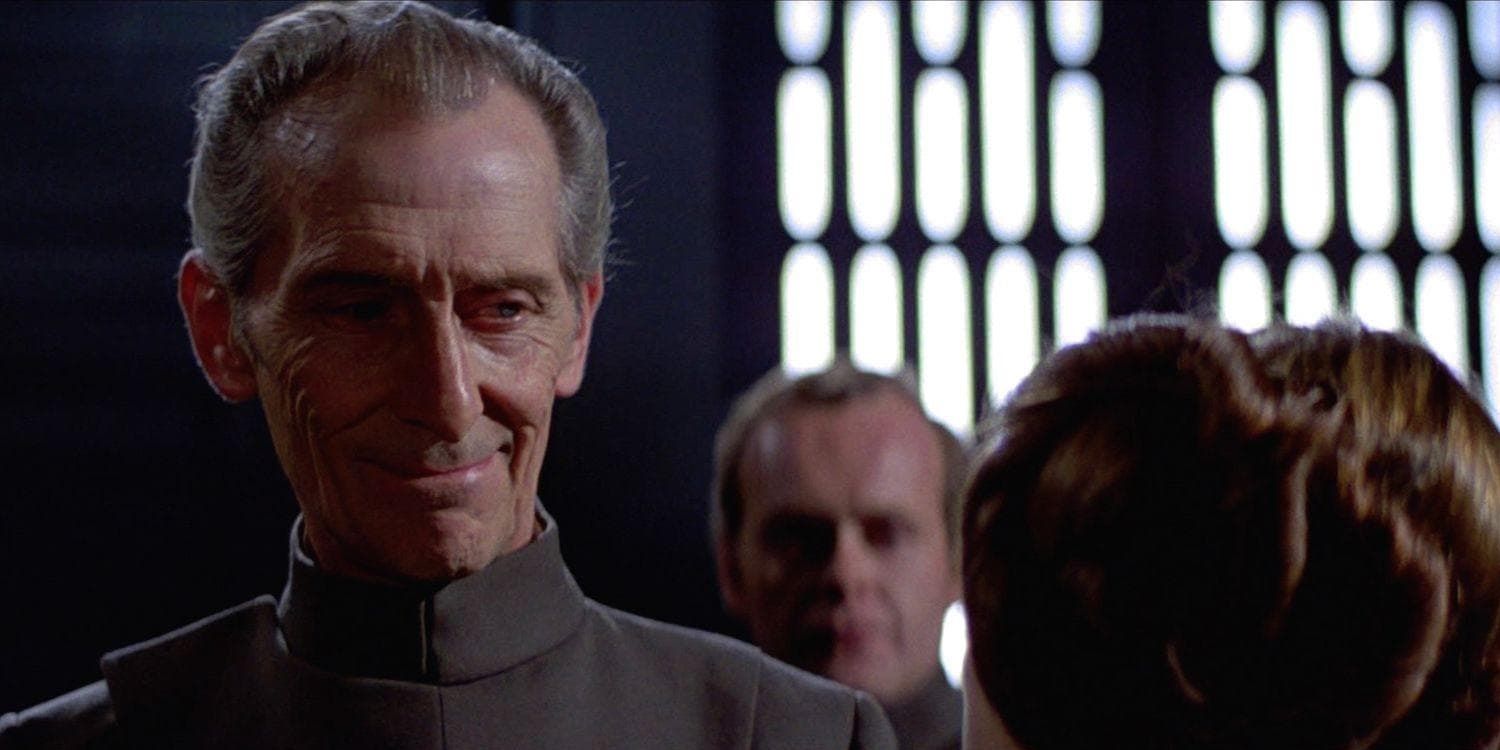 Grand Moff Tarkin smirks at Leia in Star Wars
