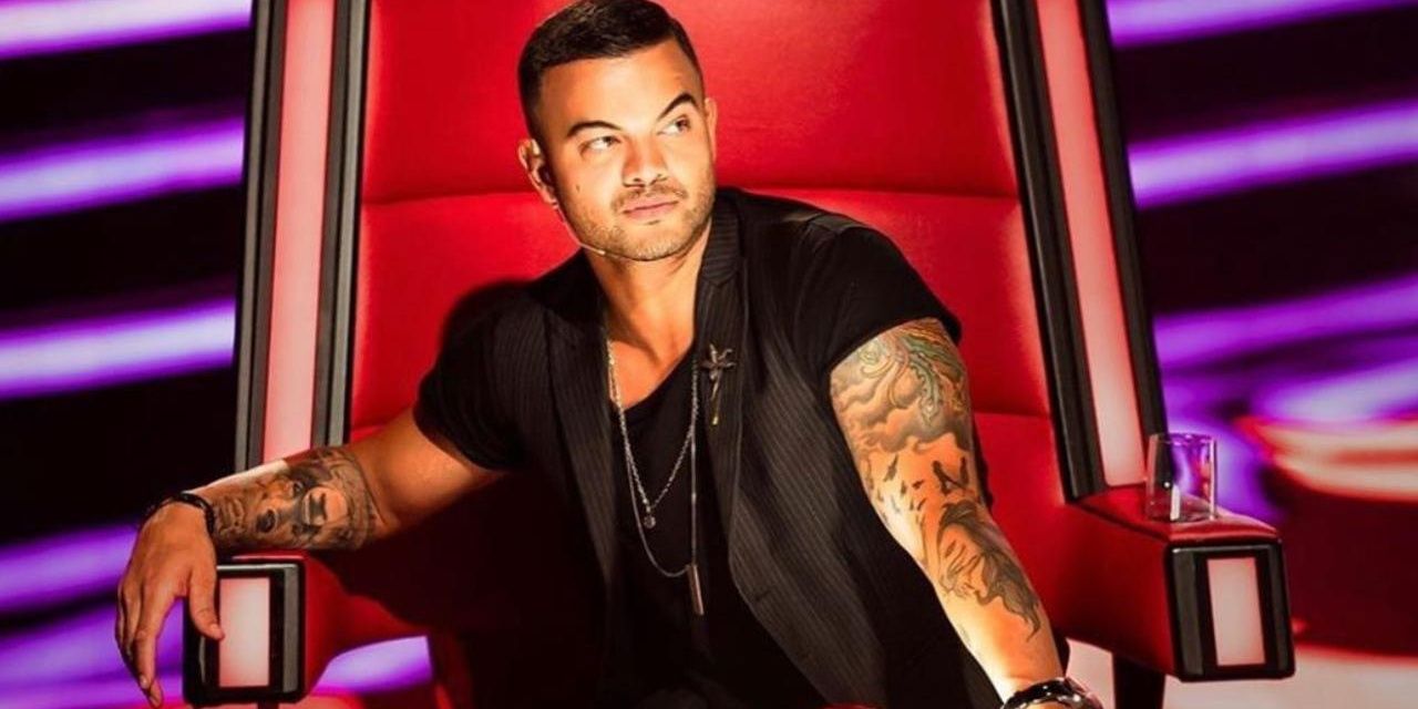 Guy Sebastian slumped in his coachs chair on The Voice Australia