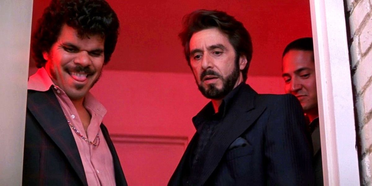 Luis Guzman and Al Pacino look into a room from Carlito's Way