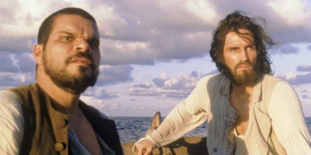 Jacopo and Edmond ride on a small boat in the Count of Monte Cristo