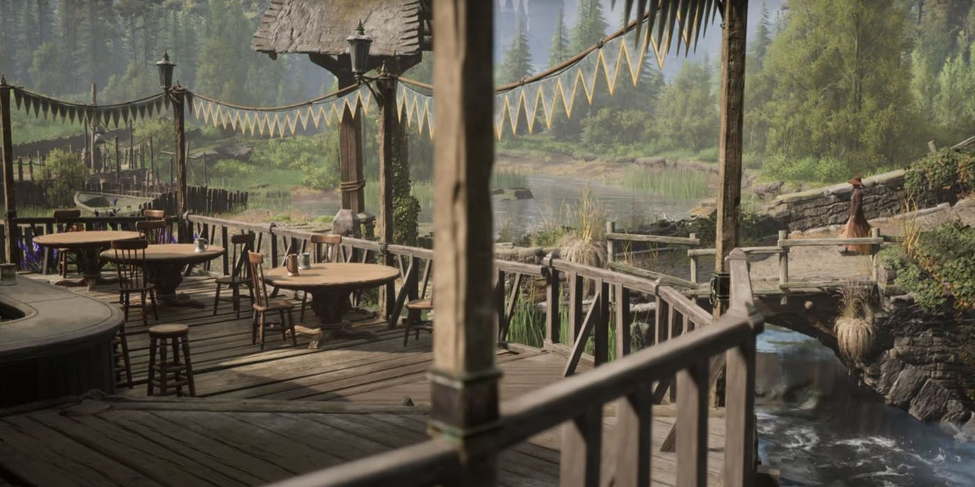 A view of an environment from Hogwarts Legacy, showing an outdoor seating area next to a stream.