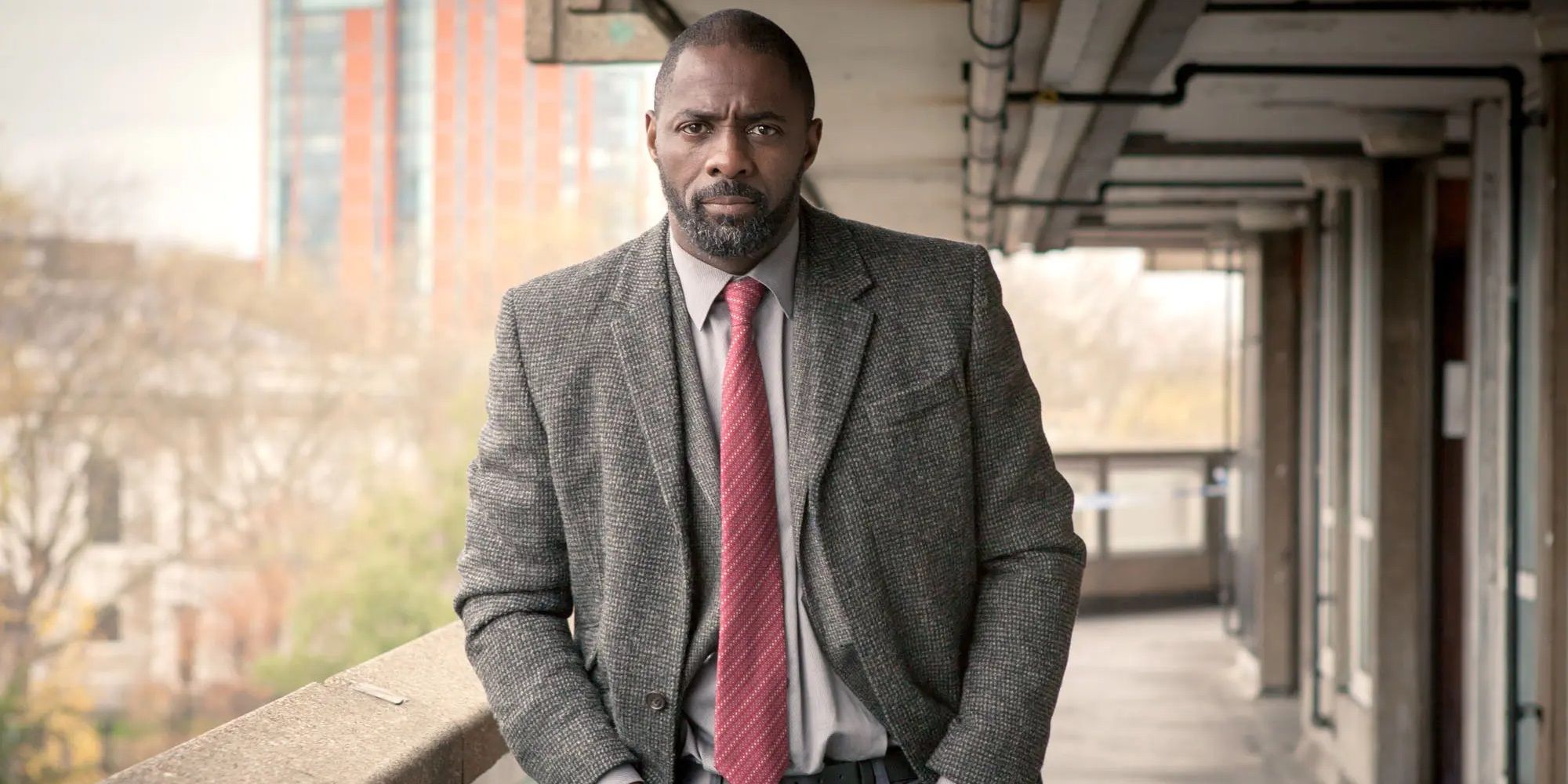 Idris Elba looks at Luther seriously
