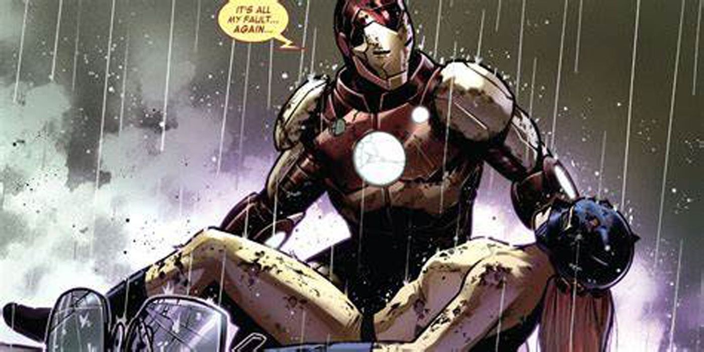 Iron Man holding Hellcat in Marvel comics