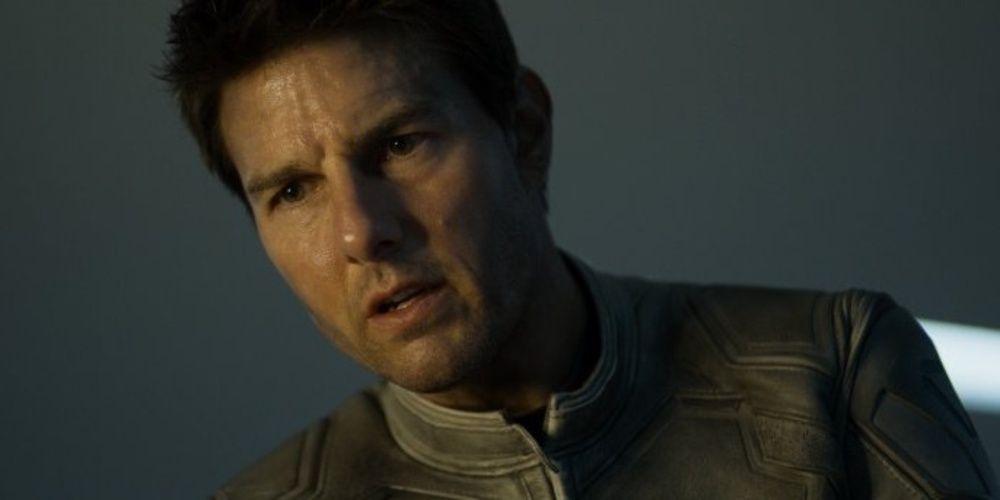Jack Harper looking down in surprise in Oblivion