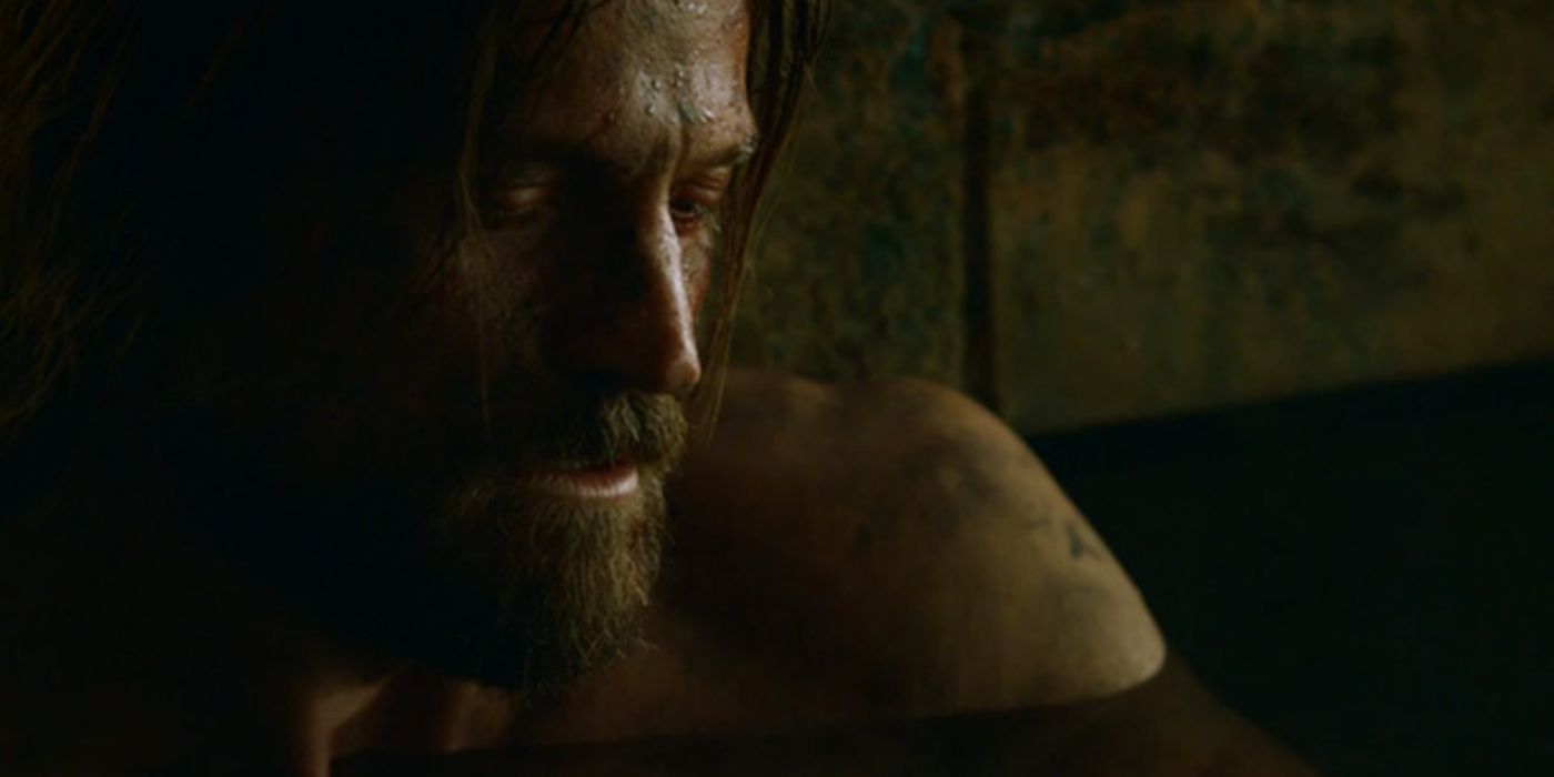 A battered Jaime bathing after being held captive by the Boltons.