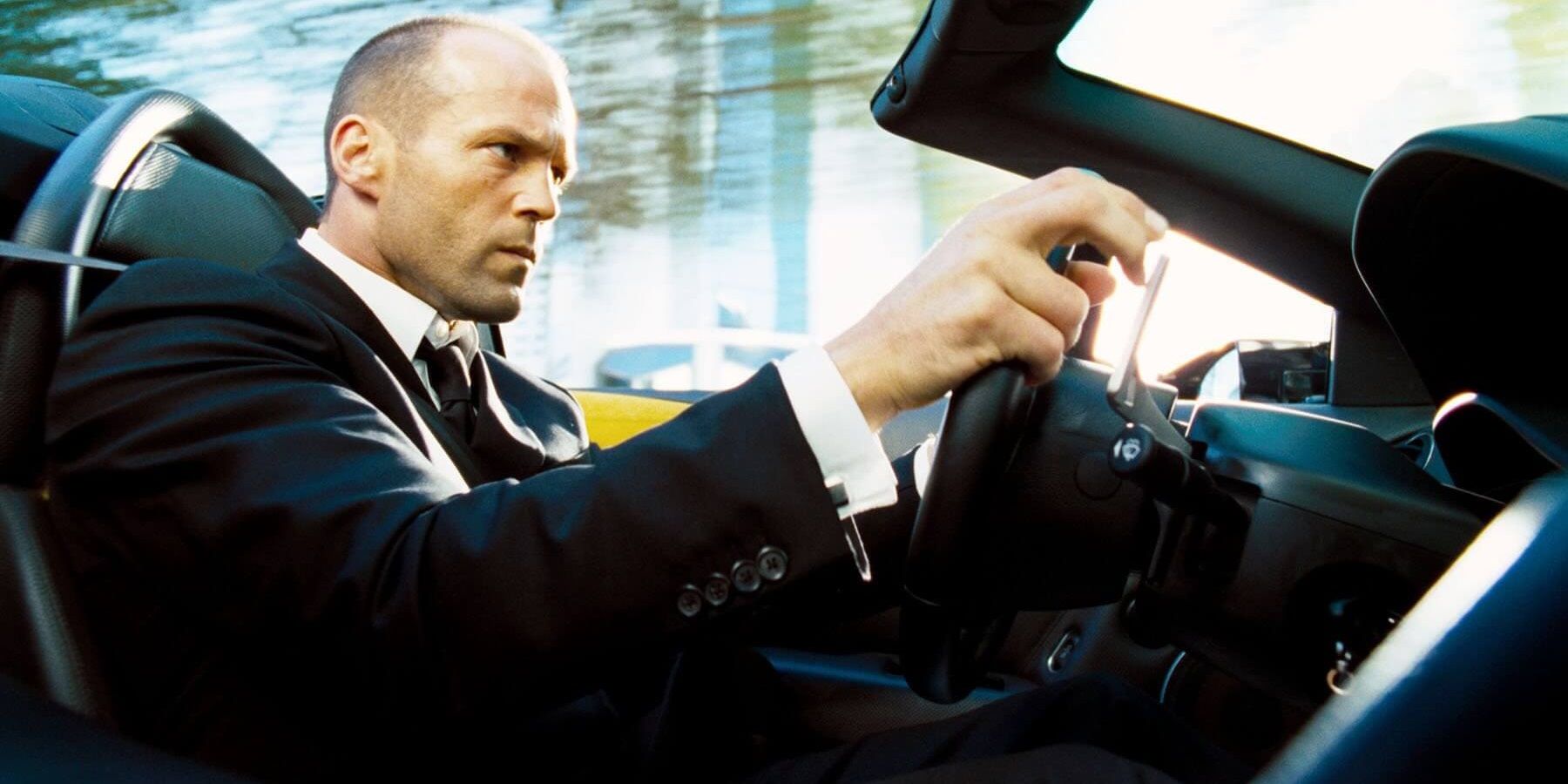 Jason Statham driving a car in The Transporter