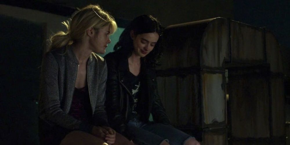 Jessica sitting with her sister in Jessica Jones