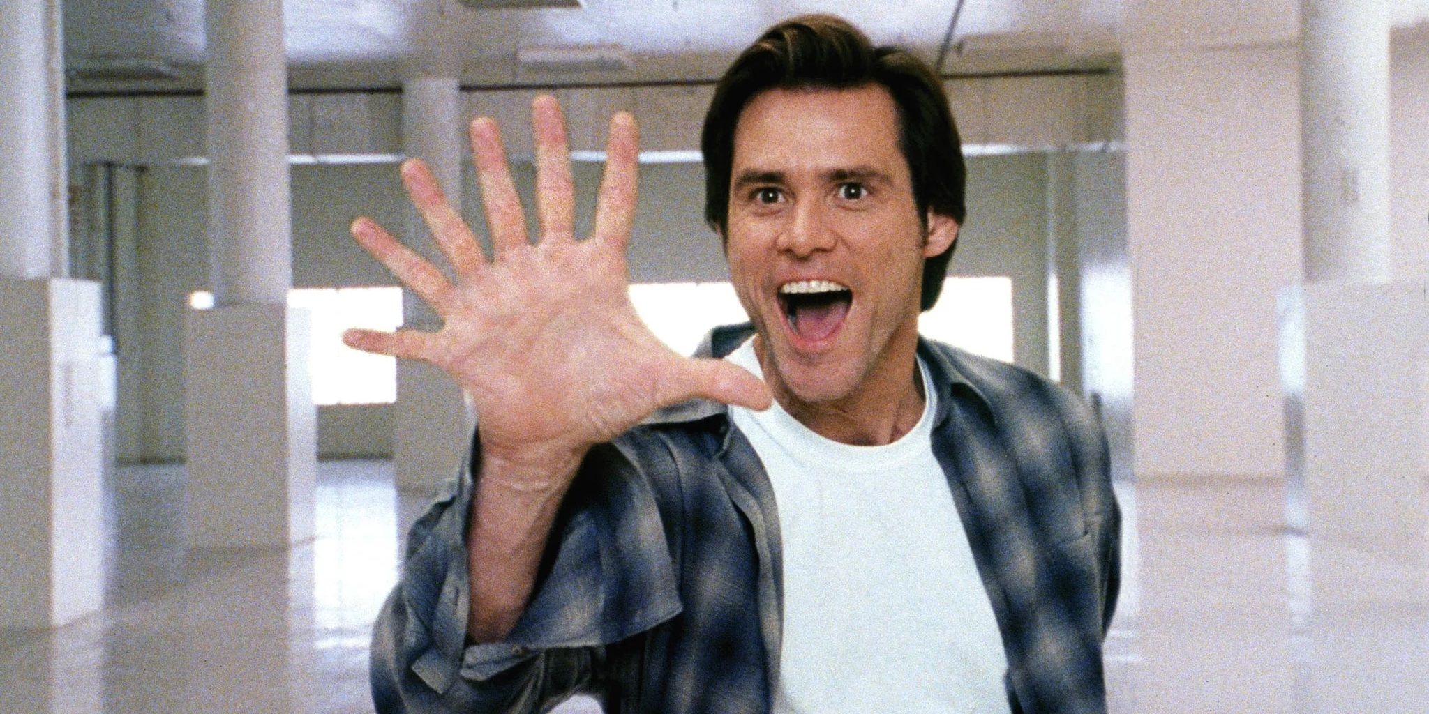 Jim Carrey with seven fingers in Bruce Almighty