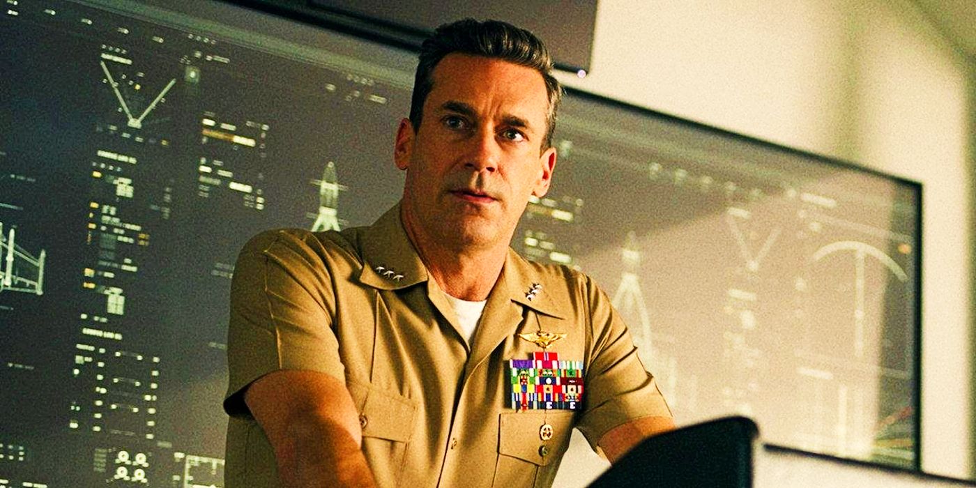 Jon Hamm as Beau Simpson looking serious in Top Gun Maverick