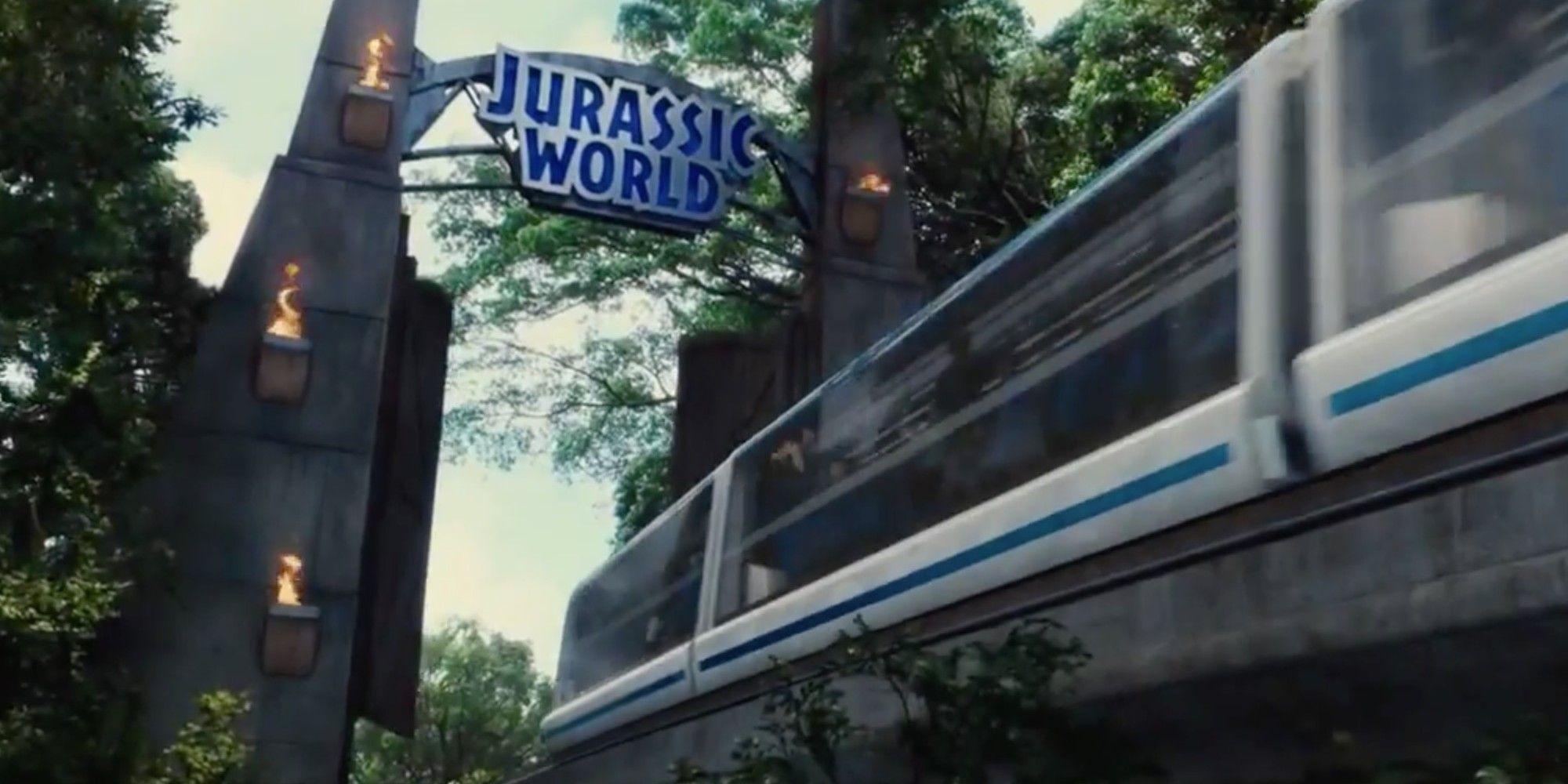 The train goes through the gate in Jurassic World