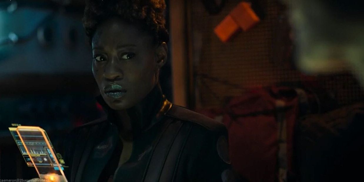 Karal monitors her fellow enforcers in The Expanse