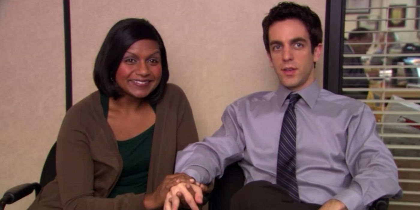 Kelly smiling and Ryan looking nervous in The Office