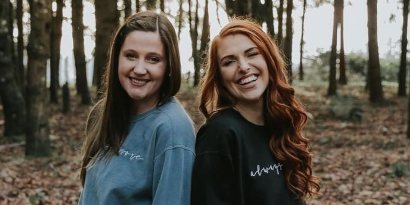 Tori and Audrey Roloff from Little People, Big World smiling together in front of trees