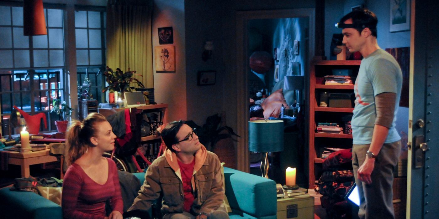 Leonard, Penny, and Sheldon sit in the dark on TBBT
