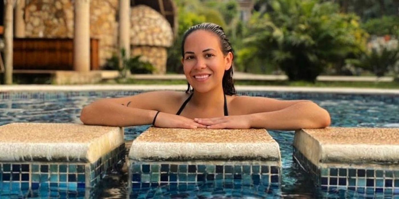 Liz Woods from 90 Day Fiancé posing inside a swimming pool