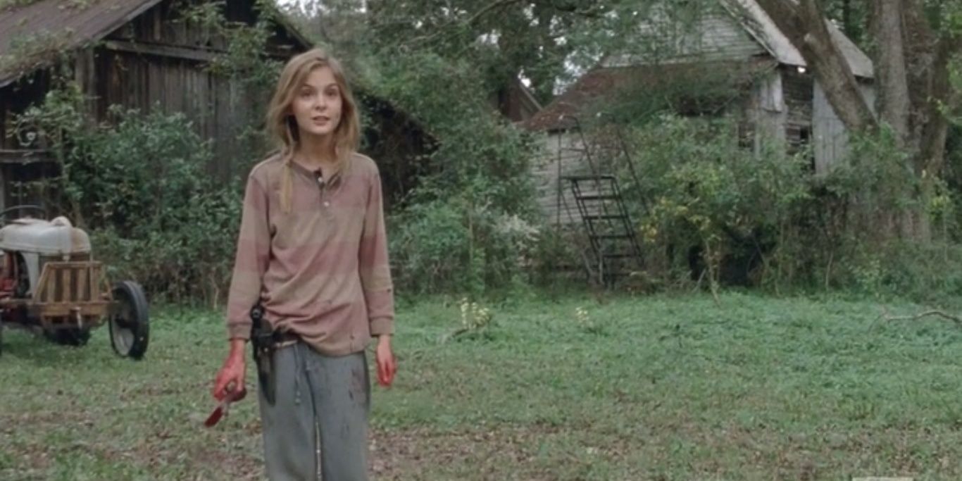 Lizzie Samuels em pé sobre o corpo de sua irmã em The Walking Dead 