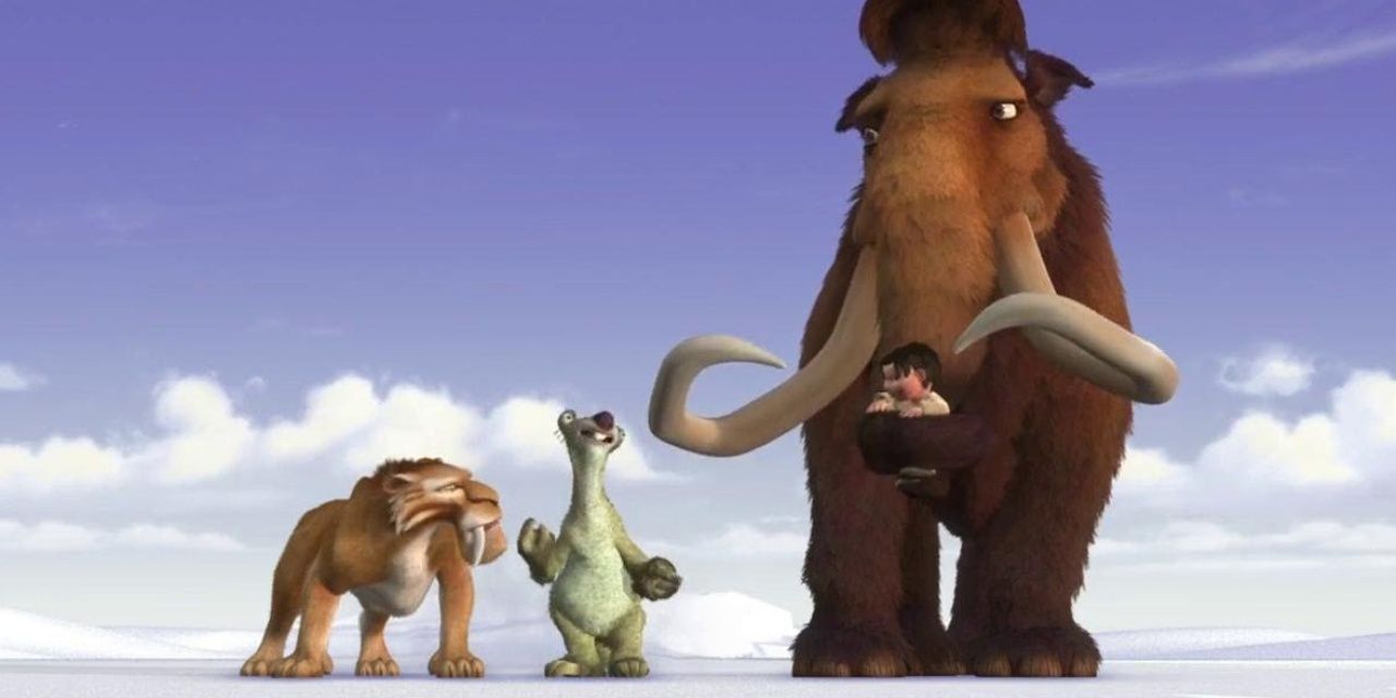 Manny Diego and Sid carry a smiling baby in Ice Age 2002
