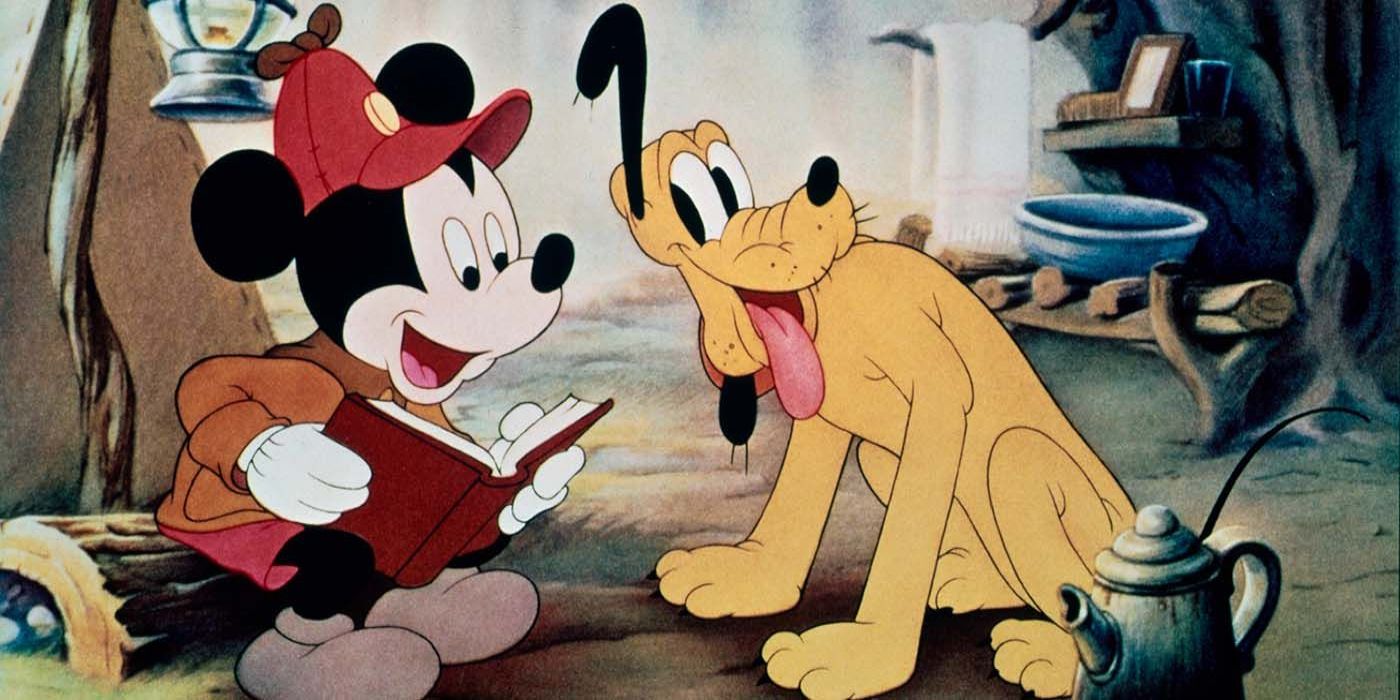 A still of Mickey and Pluto from an old Disney cartoon.