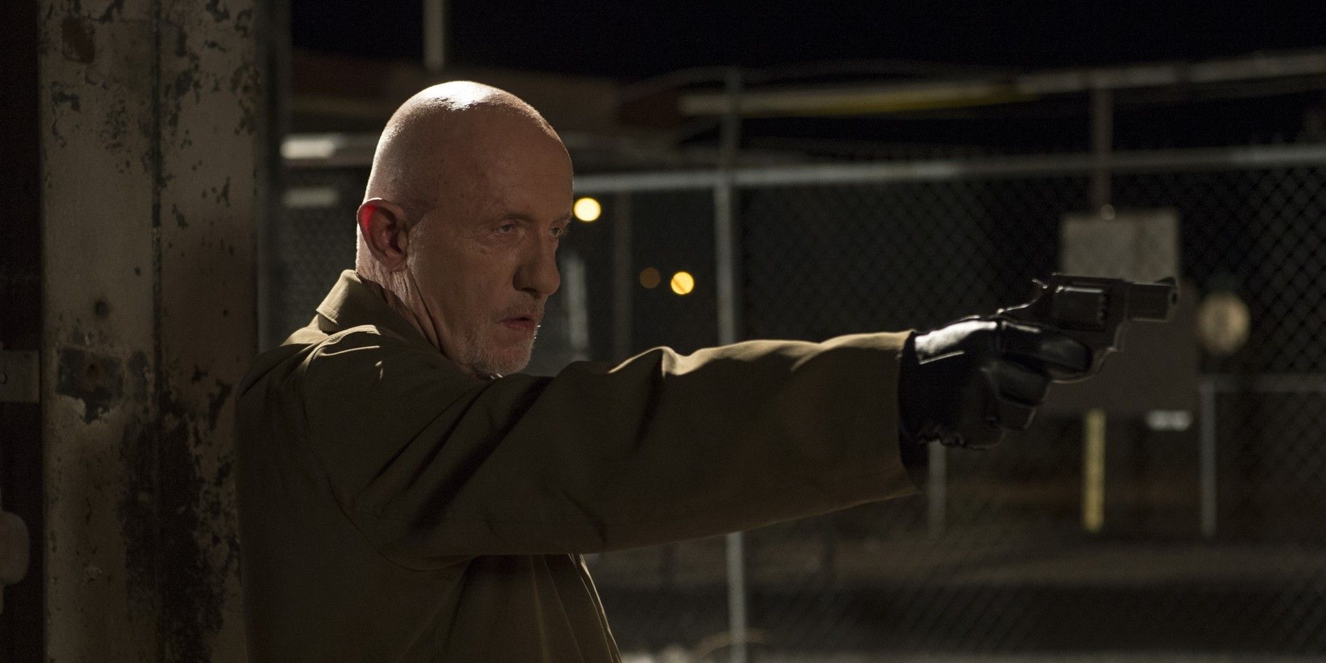 Mike pointing a gun in Five-O Better Call Saul