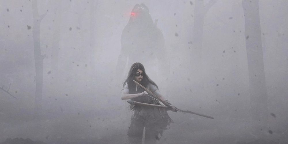 The predator stalks Naru through an area of burned forest in Prey