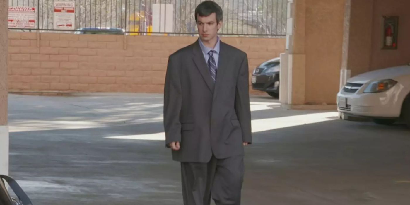 Nathan Fielder in a large suit