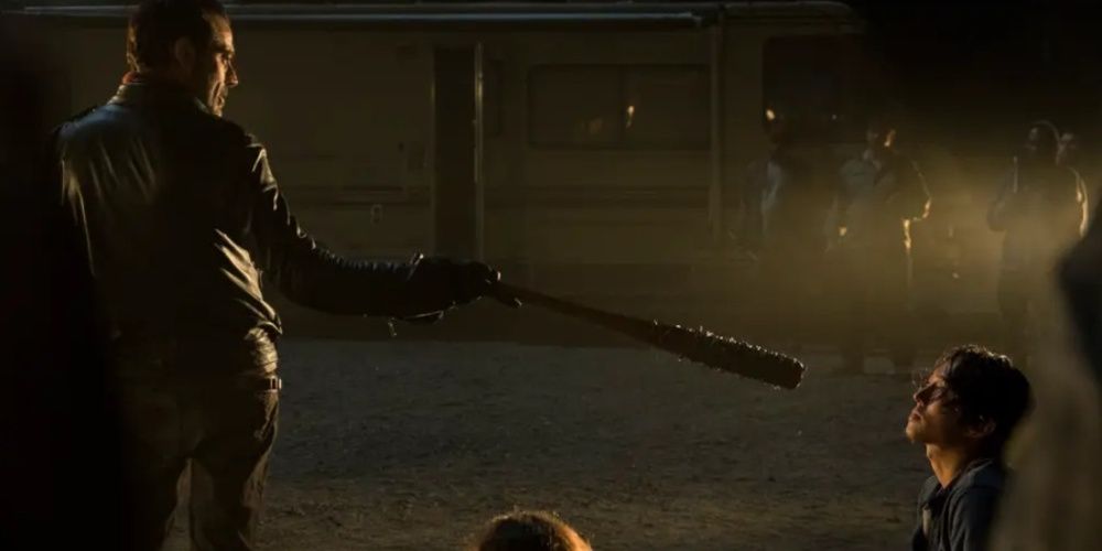 Negan brandishing his bat at Glenn in The Walking Dead 