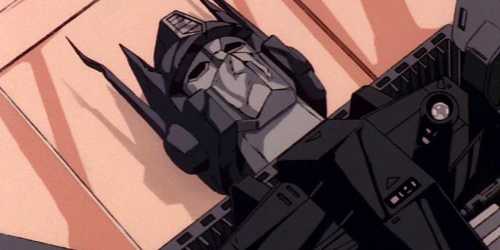An image of Optimus Prime dying in Transformers: Animated Movie