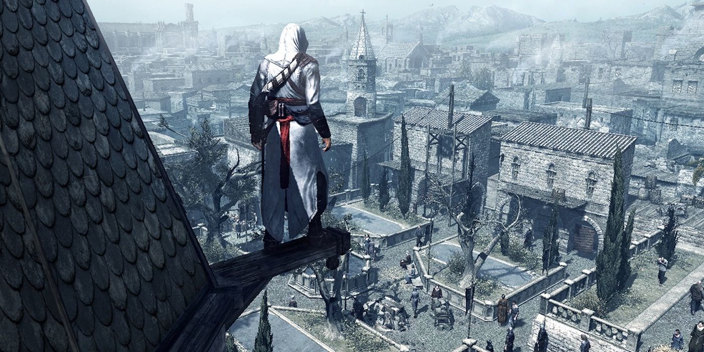 The protagonist of Assassin's Creed overlooks a city from a high perch.