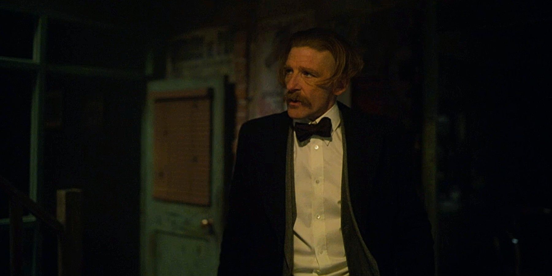 Paul Anderson looking around as Arthur Shelby in Peaky Blinders.