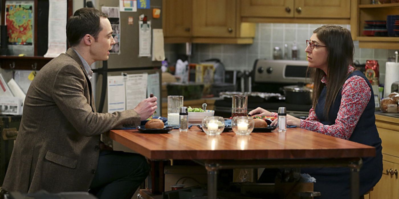 Penny and Sheldon talking at dinner on TBBT