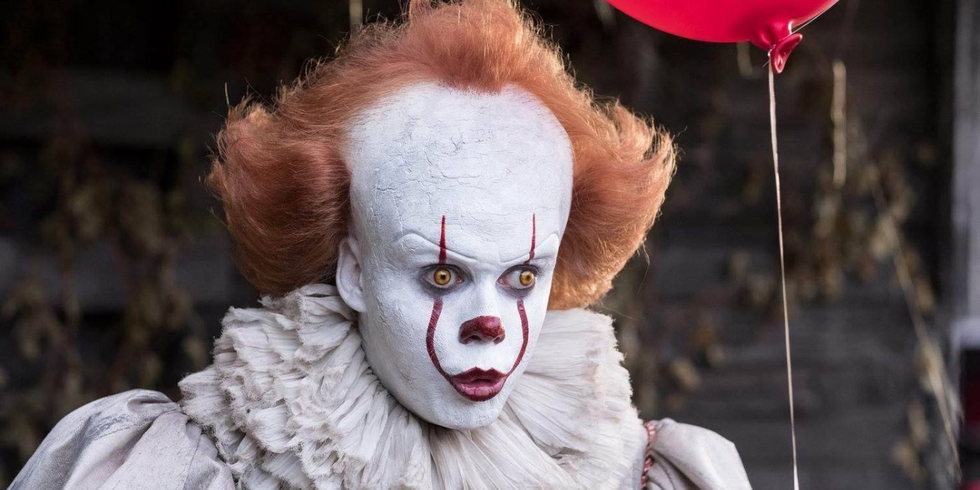 Pennywise holding a balloon in It