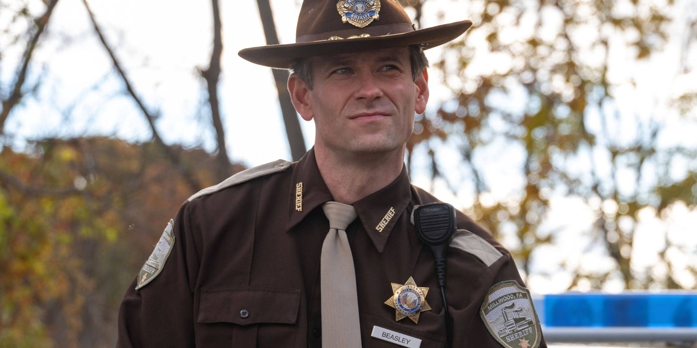 Sheriff Beasley looking serious in his uniform in Pretty Little Liars: Original Sin