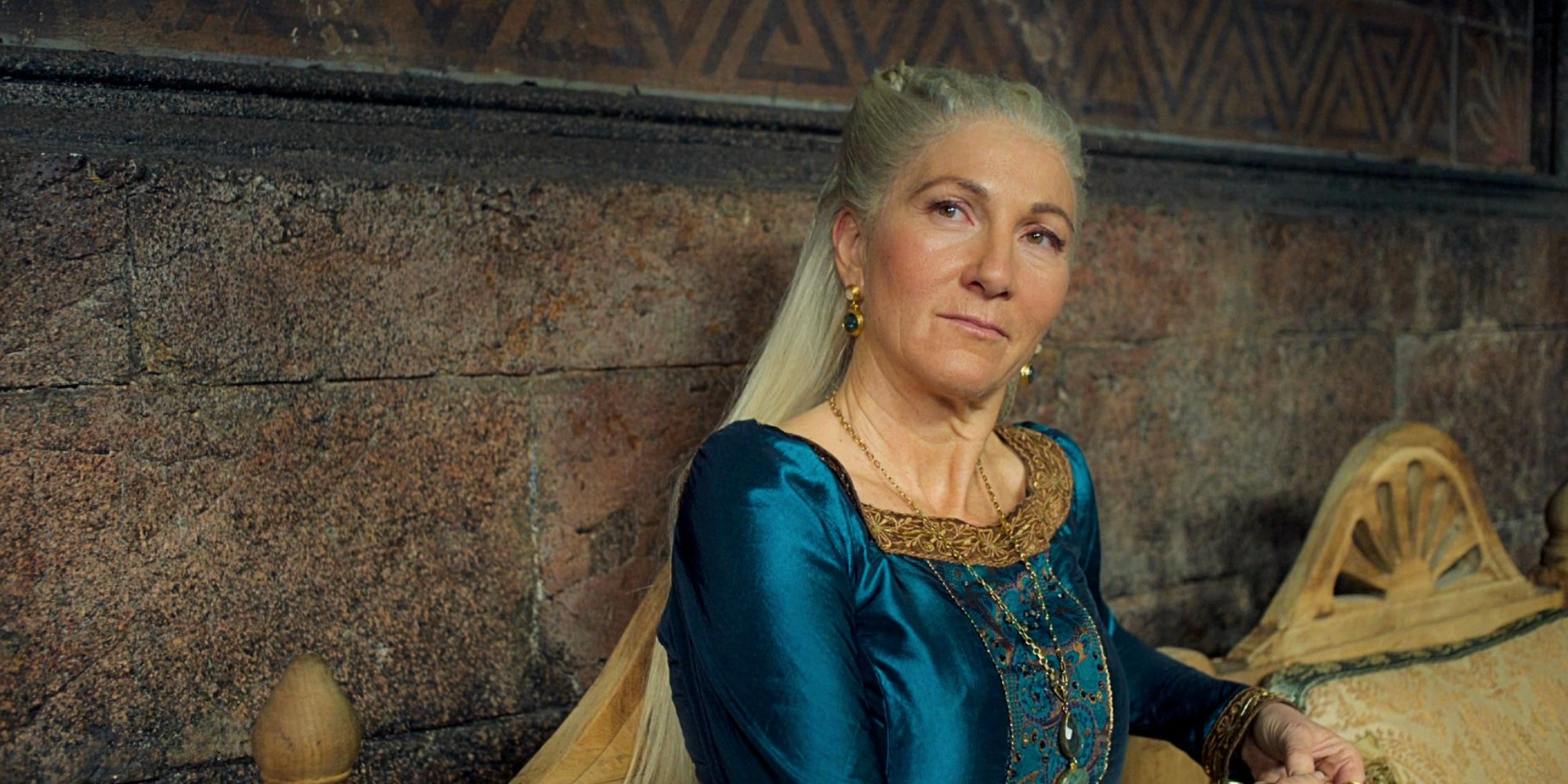 Rhaenys looking smug in a blue dress in House of the Dragon.