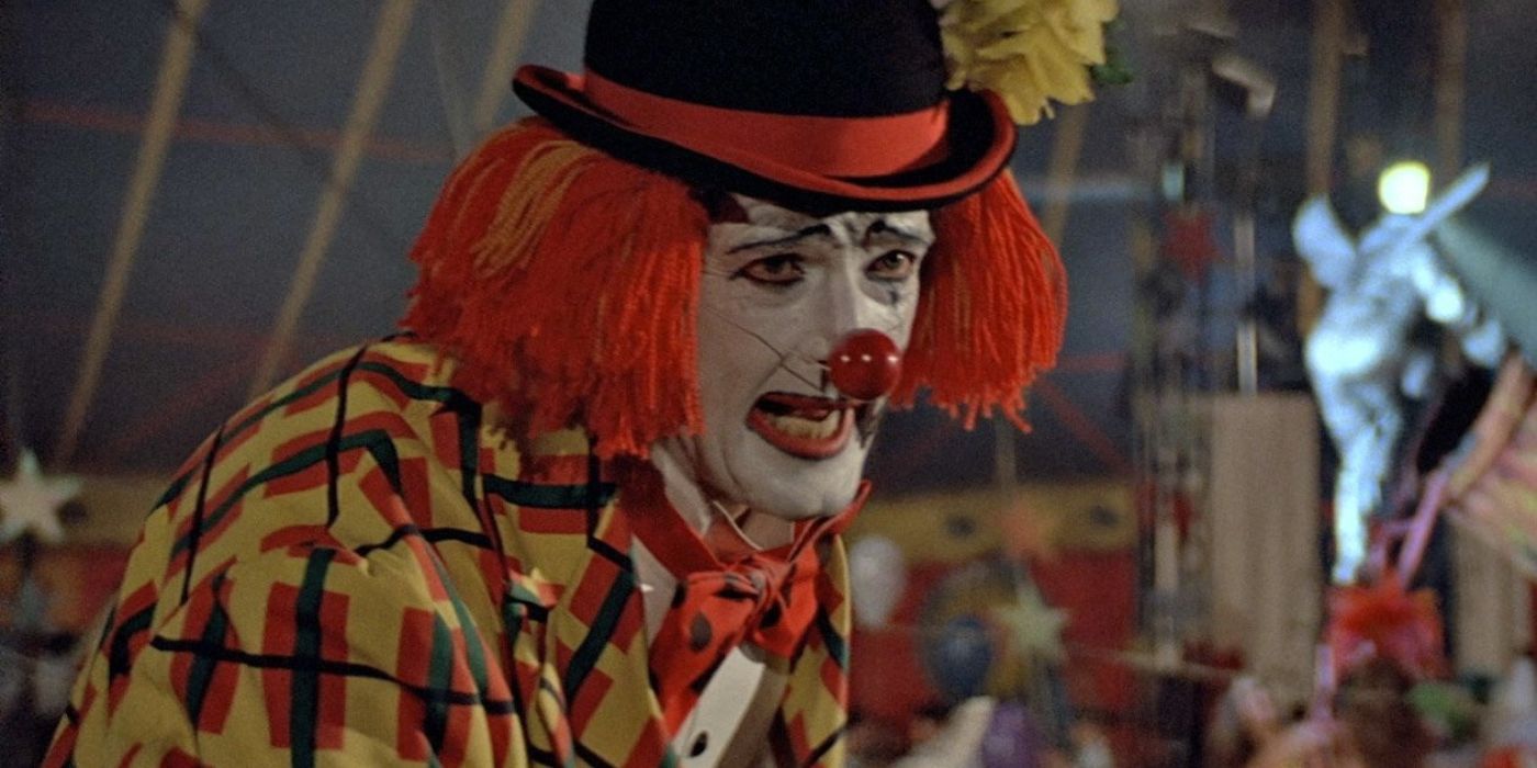 Roger Moore as James Bond disguised as a clown in Octopussy.