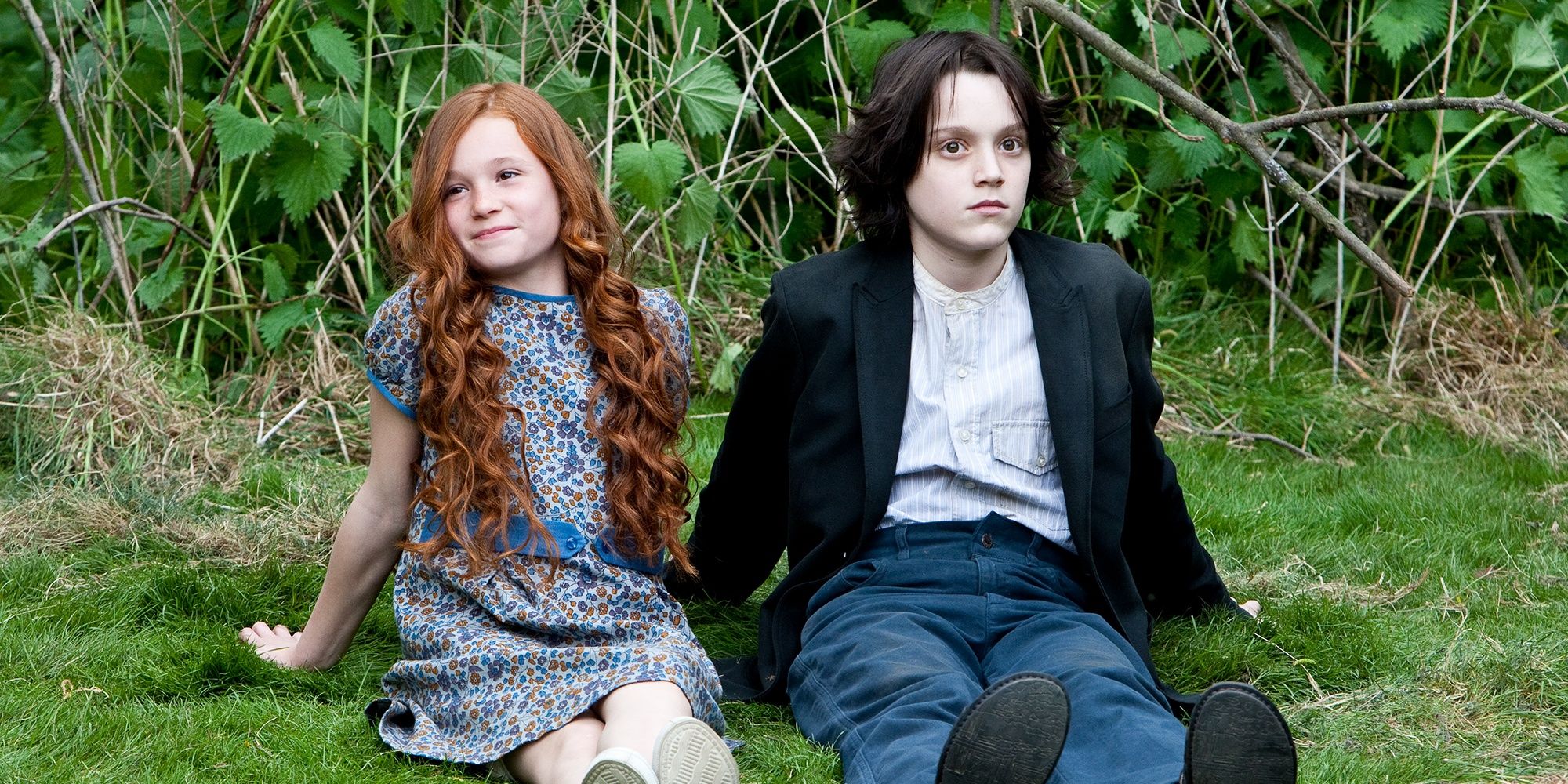 Severus Snape and Lily Potter in a field in Harry Potter and the Deathly Hallows - Part 2 