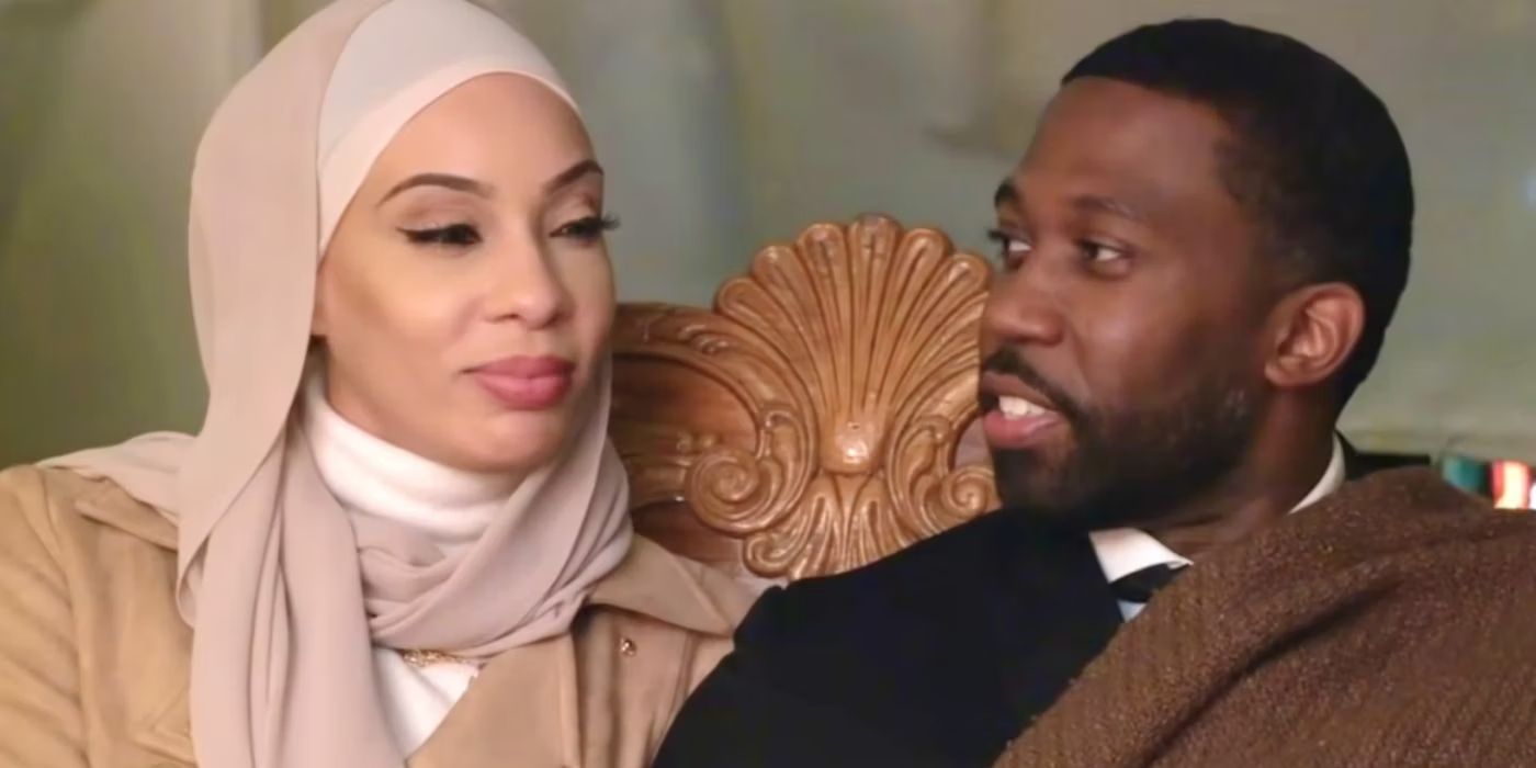 Shaeeda and Bilal in living room 90 Day Fiancé smiling at each other