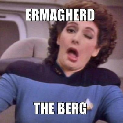 Deanna Troi winks exaggeratedly from Star Trek TNG