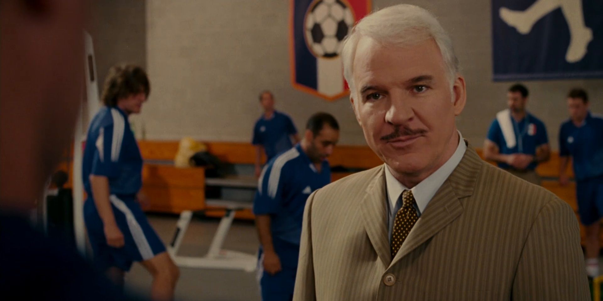 Steve Martin as Inspector Clouseau in a school gym in The Pink Panther